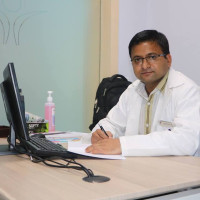 Dr. Daman Kumar Jha